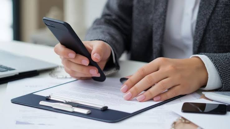 Insurance professionals reviewing policy documents